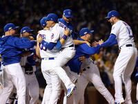 articles/2016/10/24/a-delirious-cubs-fan-worries-how-winning-will-change-the-lovable-losers/161023-Glawe-Cubs-pennant-victory-tease_rdup8i