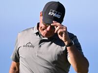 2022-01-27T020307Z_438117771_MT1USATODAY17569286_RTRMADP_3_PGA-FARMERS-INSURANCE-OPEN-FIRST-ROUND_bjqlek