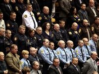 articles/2011/12/17/more-cops-shot-as-felons-buy-illegal-guns-online/cops-guns-dzieza_kjhtzp