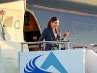Laura Loomer strides off Donald Trump’s plane ahead of the ABC News Presidential Debate in September.