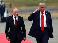 ANCHORAGE, ALASKA - AUGUST 15: (RUSSIA OUT) U.S. President Donald Trump welcomes Russian President Vladimir Putin to Joint Base Elmendorf-Richardson on August 15, 2025 in Anchorage, Alaska. The two leaders are meeting for peace talks aimed at ending the war in Ukraine. (Photo by Contributor/Getty Images)