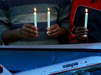 articles/2014/03/20/australia-has-located-two-objects-in-the-hunt-for-mh370/140320-samuels-pieces-found_qj666g