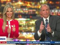 Newsmax panelists Jenn Pellegrino and Mark Morgan pretend to shoot during broadcast of The Right Squad.
