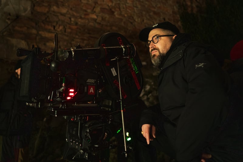 Director Robert Eggers on the set of his film Nosferatu.