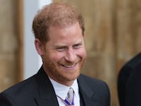 Prince Harry leaves after the Coronation of King Charles III, at Westminster Abbey, in London, Britain May 6, 2023.