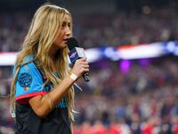 Ingrid Andress sings the national anthem prior to the 2024 T-Mobile Home Run Derby at Globe Life Field in Arlington, Texas.