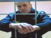 Russian opposition leader Alexei Navalny is seen on a screen via a video link from the IK-2 corrective penal colony in Pokrov during a court hearing to consider an appeal against his prison sentence in Moscow, Russia, May 24, 2022.
