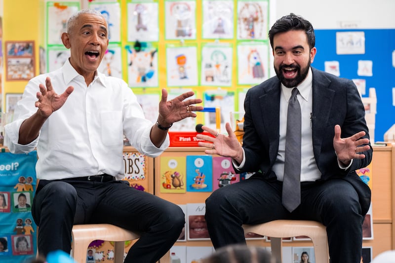 Former President Barack Obama and Mayor Zohran Mamdani sing "The Wheels on the Bus" during a shared reading event at Learning Through Play Pre-K on April 18, 2026, in the Bronx borough of New York City.