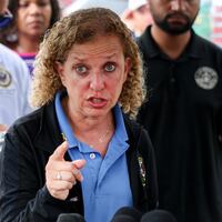 OCHOPEE, FLORIDA - JULY 12: Rep. Debbie Wasserman Schultz (D-FL), Rep. Darren Soto (D-FL) (L), and Rep. Maxwell Frost (D-FL) during a press conference after visiting "Alligator Alcatraz" at the Dade-Collier Training and Transition Airport on July 12, 2025, in Ochopee, Florida. Members of Congress were given their first visit to the new state-managed immigration detention facility in the Florida Everglades that officials have named “Alligator Alcatraz.” (Photo by Joe Raedle/Getty Images)