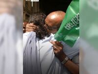 Yousra Elbagir hugs her uncle.