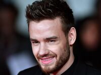Liam Payne smiles