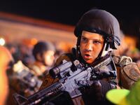 articles/2014/08/27/koch-brothers-take-on-camo-wearing-cops/140826-mak-police-tease_avehai
