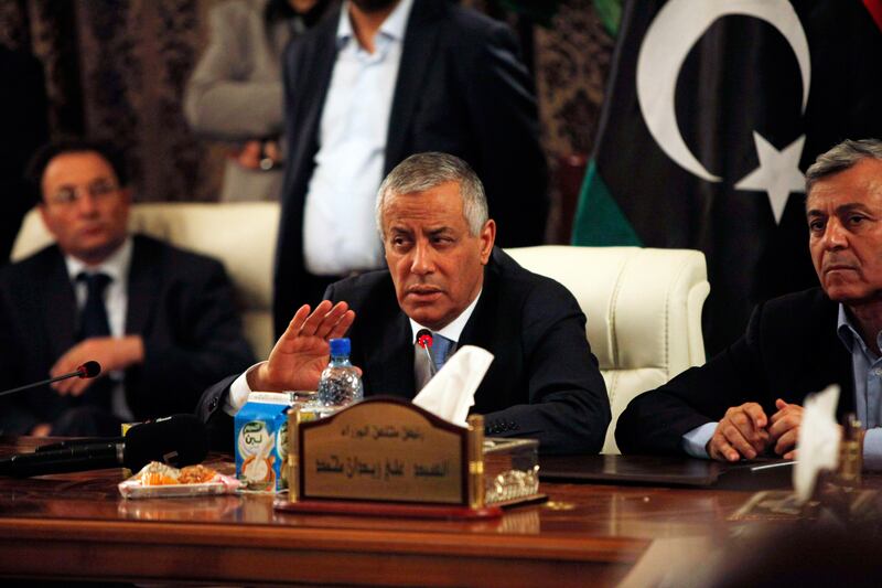 articles/2013/10/11/libya-s-attempted-coup-inside-the-kidnapping-of-prime-minister-ali-zidan/131011-dettmer-libya-tease_kua2lc