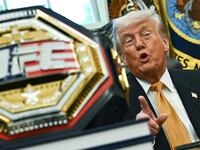 A UFC championship belt is displayed as US President Donald Trump speaks about the upcoming "UFC Freedom 250" event, in the Oval Office of the White House on May 6, 2026, in Washington, DC. An Ultimate Fighting Championship event will be staged on the White House's South Lawn in June. The June 14 event has been dubbed "UFC Freedom 250," in reference to the United States' 250th anniversary celebrations this summer. (Photo by Kent NISHIMURA / AFP via Getty Images)