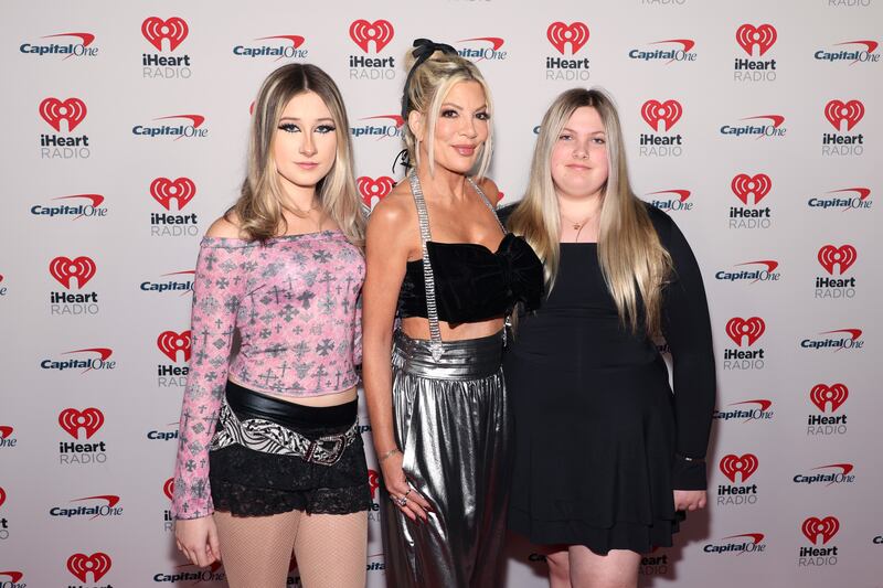 Stella McDermott, Tori Spelling, and Hattie McDermott attends iHeartRadio 102.7 KIIS FM's Jingle Ball 2024 Presented by Capital One at Intuit Dome on December 06, 2024 in Los Angeles, California.