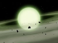 Enriched from above: The cool white dwarf WDJ1330+6435 has accreted sodium-rich rocky material from its planetary system into its atmosphere. The immense atmospheric density causes the sodium to absorb light over broad range of yellow, orange, and red wavelengths, giving the WDJ1330+6435 a ghostly green appearance. Credit: Mark A Garlick/University of Warwick