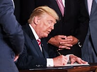 190213-swin-sign-trump-tease_nbmoqv