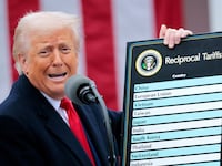 President Donald Trump holding up his tariff chart on what he called “Liberation Day” on April 2 as he has moved to impose sweeping tariffs on countries around the world since taking office.