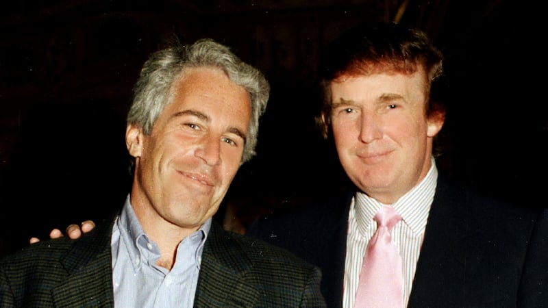 Portrait of American financier Jeffrey Epstein (left) and real estate developer Donald Trump as they pose together at the Mar-a-Lago estate, Palm Beach, Florida on February 22, 1997. (Photo by Davidoff Studios/Getty Images)