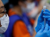 2021-08-16T053512Z_2119179524_RC216P9NDAHH_RTRMADP_3_HEALTH-CORONAVIRUS-JAPAN_nillaq