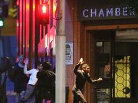 articles/2014/12/14/dozens-held-in-hostage-crisis-in-sydney-amid-fears-of-islamic-terrorism/141215-hostages-run-cheat_dxwqtp