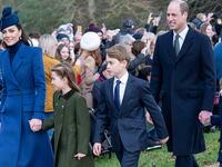 Catherine, Princess of Wales (L) and Prince William, Prince of Wales (2nd R) with Prince Louis of Wales (R), Prince George of Wales (C) and Princess Charlotte of Wales (2nd L) attend the Christmas Day service at St Mary Magdalene Church on December 25