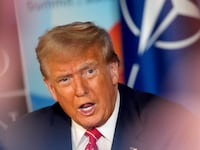 THE HAGUE, NETHERLANDS - JUNE 25: U.S. President Donald Trump speaks to media at the start of the second day of the 2025 NATO Summit on June 25, 2025 in The Hague, Netherlands. Among other matters, members are to approve a new defense investment plan that raises the target for defense spending to 5% of GDP. (Photo by Andrew Harnik/Getty Images)