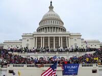 US President Donald Trump's supporters gather outside the Capitol building.