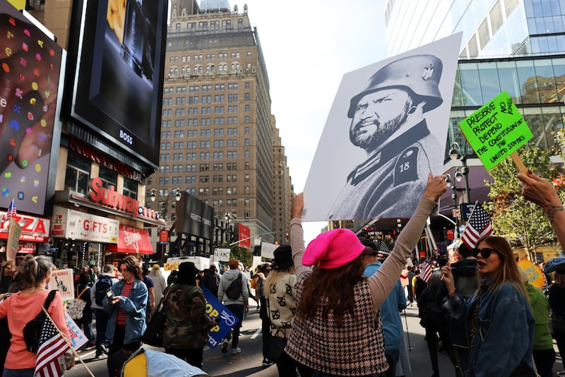 Thousands of people participate in a "No Kings" protest in Manhattan on October 18, 2025, in New York City.
