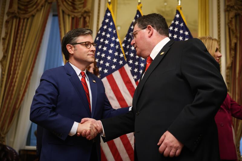 WASHINGTON, DC - APRIL 02: U.S. Speaker of the House Rep. Mike Johnson (R-LA) (L) shakes hands with Rep. Randy Fine (R-FL) (R) after participating in a ceremonial swearing-in at the U.S. Capitol on April 02, 2025 in Washington, DC. The swearing-in comes after Johnson sent the House home until the following Monday after trying to block a vote on Rep. Anna Paulina Luna's (R-FL) proposal for proxy voting for new parents failed. (Photo by Kayla Bartkowski/Getty Images)