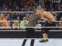 articles/2015/08/23/jon-stewart-kicks-ass-at-wwe-summerslam-bashes-john-cena-with-a-chair/150823-stern-wwe-stewart-tease_p88f3s