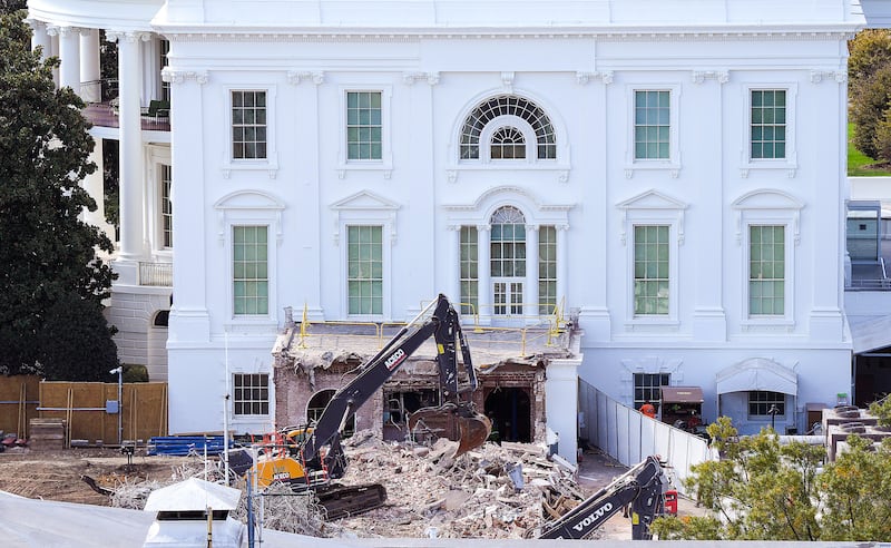 An excavator works to clear rubble after the East Wing of the White House was demolished on October 23, 2025 in Washington, DC.