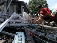 articles/2014/08/06/from-embattled-donetsk-a-plea-for-body-bags/140806-Nemtsova-BodyBags-tease_mgbl50