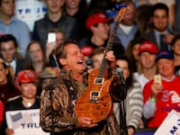 Musician and political activist Ted Nugent performs for the audience during a campaign rally for U.S. Republican presidential nominee Donald Trump at the Devos Place in Grand Rapids, Michigan November 7, 2016.