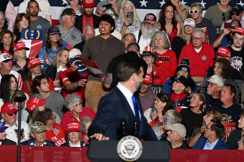 HENDERSONVILLE, NORTH CAROLINA - OCTOBER 19: U.S. Vice President JD Vance is interrupted as he delivers remarks at a campaign rally at Hyder Warehouse on October 19, 2026 in Hendersonville, North Carolina. Vance is headlining a midterm campaign rally organized by the Trump 47 Committee Inc. to support Republican candidates ahead of the upcoming elections. (Photo by Kenny Holston-Pool/Getty Images)