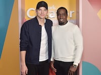 Ashton Kutcher (L) and Sean Combs in 2019.