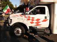 A U-Haul truck that reportedly was driven into a crowd is pictured during a "Free Iran" rally in Los Angeles, California, on January 11, 2026.