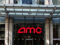 AMC logo is seen on a building. AMC Theaters is abandoning a tiered-pricing plan to charge more for better seats in its theaters.