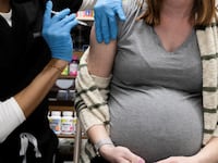 2021-02-12T050805Z_688117347_RC2TQL9JYNKJ_RTRMADP_3_HEALTH-CORONAVIRUS-VACCINES_qrcog4