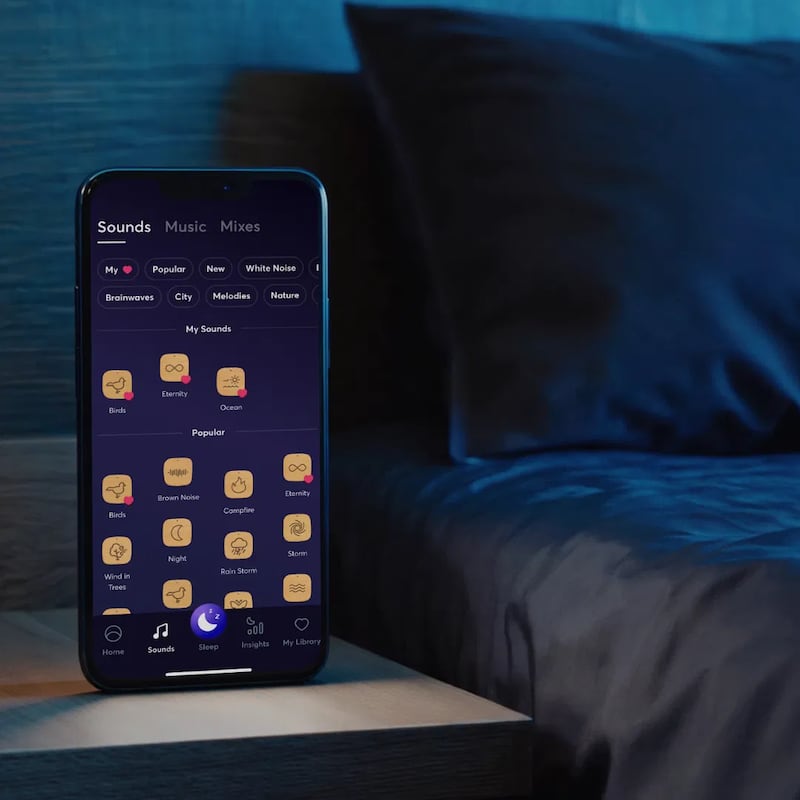 BetterSleep App on a bedside table next to bed