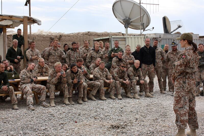 Danish Crown Princess Mary speaks to soldiers during her visit to the Danish troops in Helmand, Afghanistan.