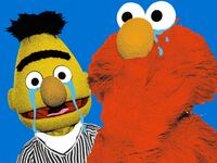 Bert and Elmo from Sesame Street crying