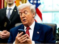 WASHINGTON, DC May 23, 2025:
US President Donald Trump silenced his cellphone in the Oval Office of the White House on Friday May 23, 2025. The executive orders were related to the nuclear power industry in the US.
(Photo by Demetrius Freeman/The Washington Post via Getty Images)