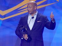 Anthony Nesty speaks after receiving the Coach of the Year award during the 2022 Golden Goggle Awards.