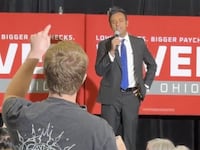 Vivek Ramaswamy is interrupted by a heckler.