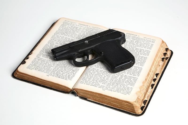 articles/2013/02/18/praying-while-packing-heat-and-other-unwieldy-american-traditions/130217-guns-church-schwartz-tease_y7ywzf