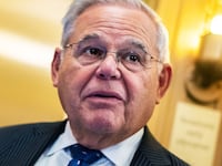 A photo including Senator Bob Menendez