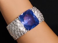 The Cartier cuff, featuring a rare Romanov sapphire, will be sold at a Swiss auction on Nov. 11.