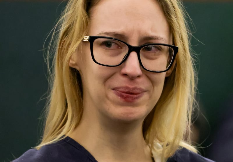 Victoria Goodwin reacts as she listens to Aaron Goodwin's victim impact statement.
