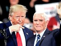 2019-12-11T034107Z_644180412_MT1USATODAY13778458_RTRMADP_3_PRESIDENT-DONALD-TRUMP-GESTURES-TOWARD-VICE-PRESIDENT-MIKE_uj4vls